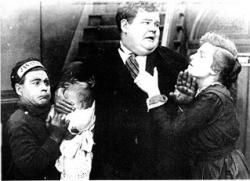 A young Oliver Hardy in the middle.