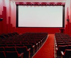 Movie theaters are the same all across the land.