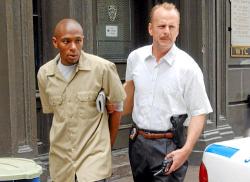 Mos Def and Bruce Willis in 16 Blocks. Mos Def and Bruce Willis in 16 Blocks.