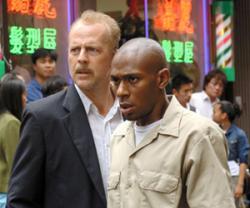 Bruce Willis and Mos Def in 16 Blocks. Bruce Willis and Mos Def in 16 Blocks.