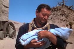 John Wayne in 3 Godfathers with little Robert William Pedro.