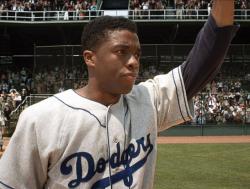 Chadwick Boseman as Jackie Robinson in 42.