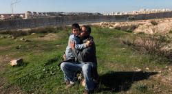 Emad Burnat with his son, Gibreel, in 5 Broken Cameras. Emad Burnat with his son, Gibreel, in 5 Broken Cameras.