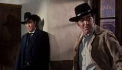 Robert Mitchum and Dean Martin in 5 Card Stud. Robert Mitchum and Dean Martin in 5 Card Stud.