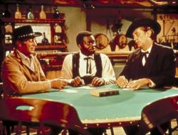 Dean Martin, Yaphet Kotto, and Robert Mitchum in 5 Card Stud. Dean Martin, Yaphet Kotto, and Robert Mitchum in 5 Card Stud.