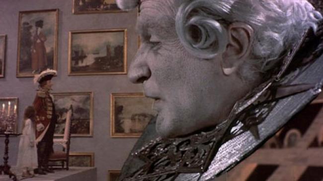 Sarah Polley, John Neville and Robin Williams's head in The Adventures of Baron Munchausen.