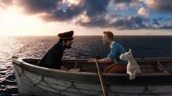 Captain Haddock (voiced by Andy Serkis) and Tintin (voiced by Jamie Bell) and Snowy the dog in The Adventures of Tintin.