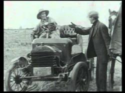 Augustus Carney buys an auto in Alkali Ike's Auto. Augustus Carney buys an auto in Alkali Ike's Auto.