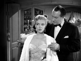 Marilyn Monroe and Addison DeWitt in All About Eve. Marilyn Monroe and Addison DeWitt in All About Eve.