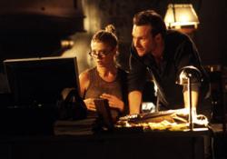 Tara Reid and Christian Slater in Alone in the Dark.