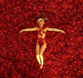 Mena Suvari on a bed of roses in American Beauty.