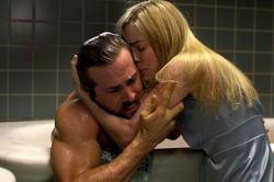 Ryan Reynolds and Melissa George in The Amityville Horror. Ryan Reynolds and Melissa George in The Amityville Horror.