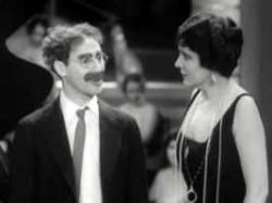 Groucho Marx and Margaret Dumont.