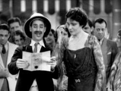 Groucho Marx and Margaret Dumont in Animal Crackers. Groucho Marx and Margaret Dumont in Animal Crackers.