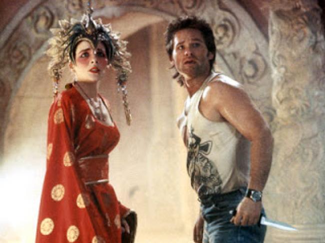 Kim Cattrall and Kurt Russell in Big Trouble in Little China. Kim Cattrall and Kurt Russell in Big Trouble in Little China.