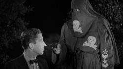 Humphrey Bogart recites their evil oath in Black Legion. Humphrey Bogart recites their evil oath in Black Legion.