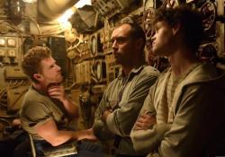 Branwell Donaghay, Jude Law and Bobby Schofield in Black Sea.