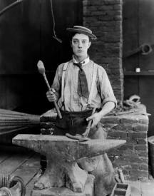 Buster Keaton as the blacksmith. Buster Keaton as the blacksmith.