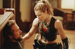 Ryan Reynolds and Jessica Biel in Blade: Trinity. Ryan Reynolds and Jessica Biel in Blade: Trinity.