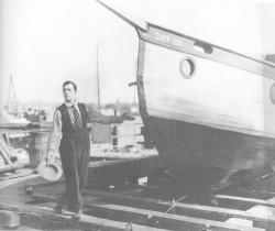 Buster proudly launches his boat.