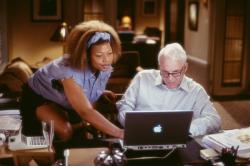 Queen Latifah and Steve Martin in Bringing Down the House. Queen Latifah and Steve Martin in Bringing Down the House.