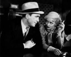 Pat O'Brien, Bette Davis and a cigarette in Bureau of Missing Persons. Pat O'Brien, Bette Davis and a cigarette in Bureau of Missing Persons.