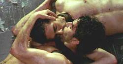 Leonardo Sbaraglia and Eduardo Noriega share an intimate moment as El Nene and Angel.