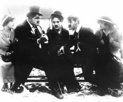 Charles Chaplin with the cast of By the Sea Charles Chaplin with the cast of By the Sea
