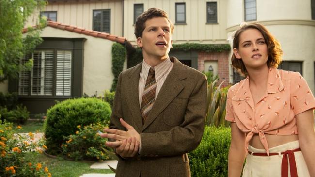 Jesse Eisenber and Kristen Stewart in Cafe Society. Jesse Eisenber and Kristen Stewart in Cafe Society.