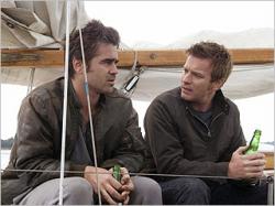 Colin Farrell and Ewan McGregor have a beer while sailing on Cassandra's Dream.