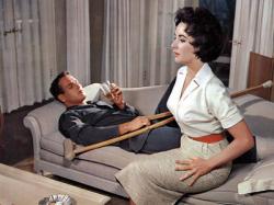Paul Newman and Elizabeth Taylor in Cat on a Hot Tin Roof. Paul Newman and Elizabeth Taylor in Cat on a Hot Tin Roof.