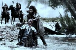 Olga Kurylenko as Etain showing why you don't want to mess with her in Centurion.