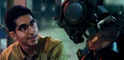 Dev Patel and Chappie in Chappie. Dev Patel and Chappie in Chappie.