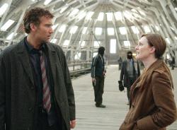 Clive Owen and Julianne Moore in Children of Men. Clive Owen and Julianne Moore in Children of Men.