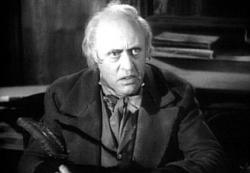 Alastair Sim as Scrooge in A Christmas Carol.