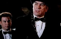 Robert Wuhl and Tommy Lee Jones in Cobb. Robert Wuhl and Tommy Lee Jones in Cobb.