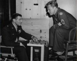 Clark Gable and Van Johnson on the set of Command Decision. Clark Gable and Van Johnson on the set of Command Decision.