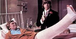 Anthony Booth and Mick Jagger look-a-like Robin Askwith in Confessions of a Window Cleaner. Anthony Booth and Mick Jagger look-a-like Robin Askwith in Confessions of a Window Cleaner.
