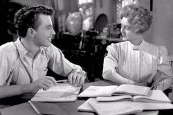 John Dall and Bette Davis in The Corn is Green. John Dall and Bette Davis in The Corn is Green.