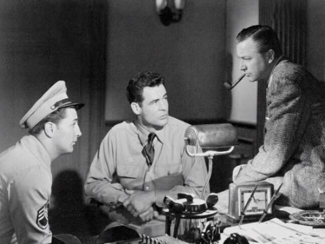 Robert Mitchum, Robert Ryan and Robert Young in Crossfire. Robert Mitchum, Robert Ryan and Robert Young in Crossfire.