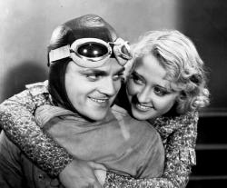 James Cagney and Joan Blondell in The Crowd Roars. James Cagney and Joan Blondell in The Crowd Roars.
