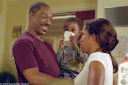 Eddie Murphy and Regina King in Daddy Day Care.