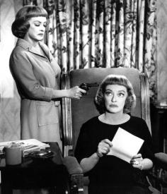 Bette Davis and Bette Davis in Dead Ringer.