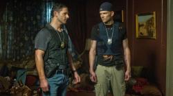 Eric Bana and Joel McHale in Deliver Us from Evil. Eric Bana and Joel McHale in Deliver Us from Evil.