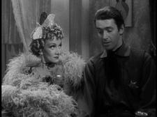 Marlene Dietrich and James Stewart in Destry Rides Again.