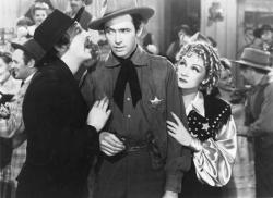 Mischa Auer, James Stewart, and Marlene Dietrich in Destry Rides Again.