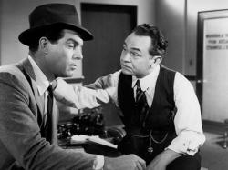 Fred MacMurray and Edward G. Robinson in Double Indemnity. Fred MacMurray and Edward G. Robinson in Double Indemnity.