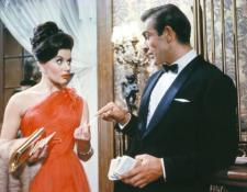 Bond with a beautiful woman in a casino makes his movie entrance. Bond with a beautiful woman in a casino makes his movie entrance.