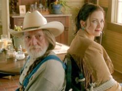 Willie Nelson and Lynda Carter in The Dukes of Hazzard.