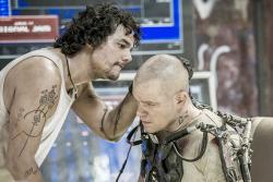 Wagner Moura and Matt Damon in Elysium.